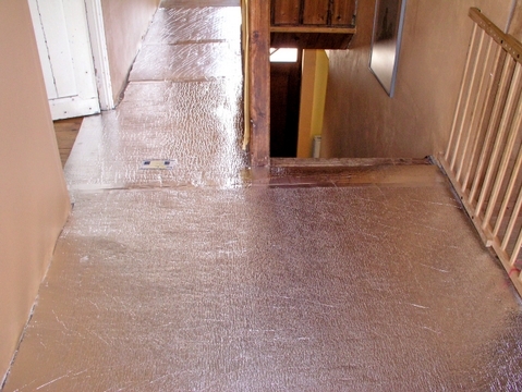 StraFlex® Producten - Isolatie van woningen: daken, wanden, vloeren - Foto ter illustratie van de verwerking onder tapijt STARFLEX Floor StraFlex® Producten - Isolatie van woningen: daken, wanden, vloeren - Foto ter illustratie van de verwerking onder tapijt STARFLEX Floor